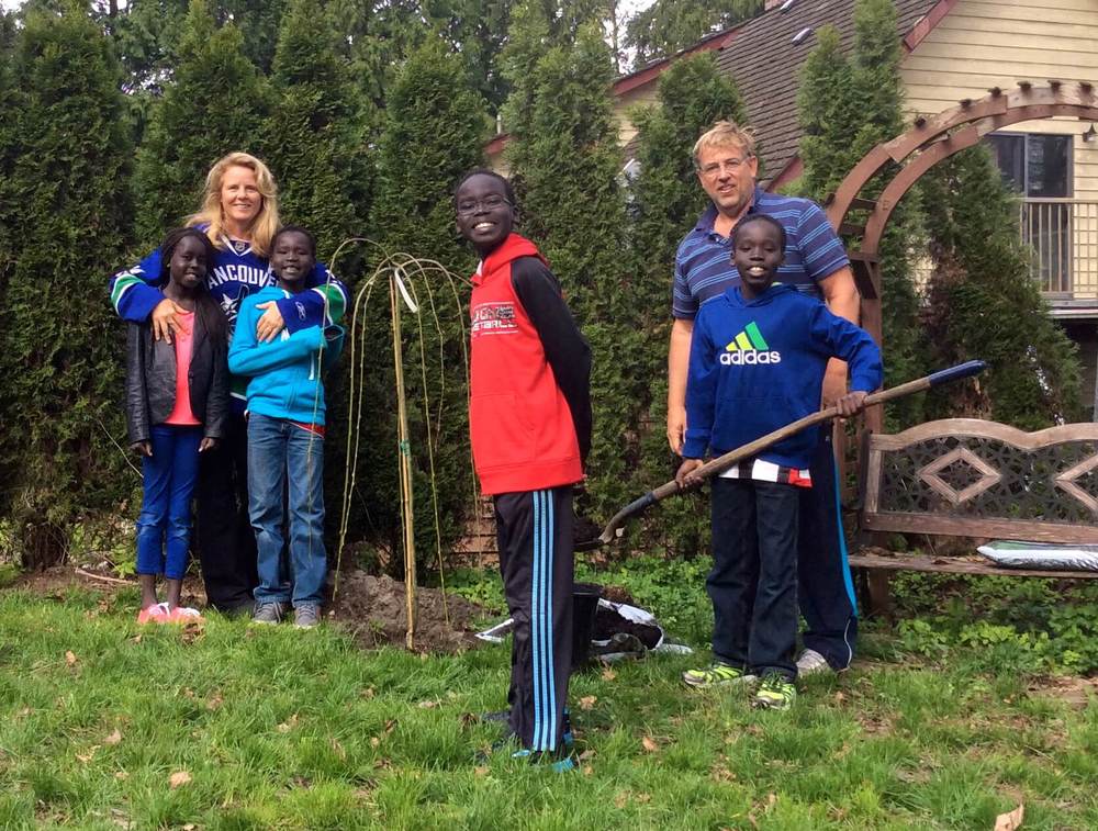 The family planted THIS TREE to signify theIR new family tree WHEN the adoption of the kids WAS OFFICIAL